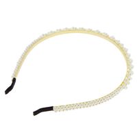 Serre-tête à perles 2 rangs tréssés